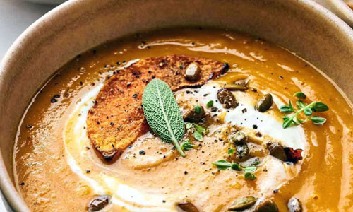Warm Pumpkin Soup in a ceramic bowl